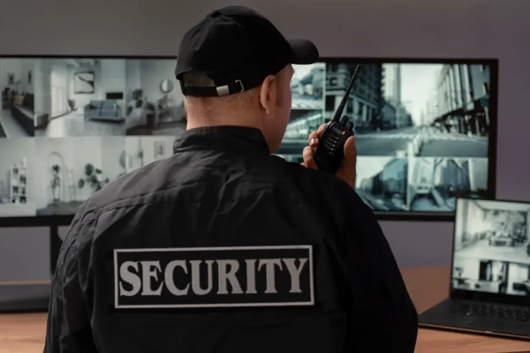 portrait-male-security-guard-with-radio-station-ca